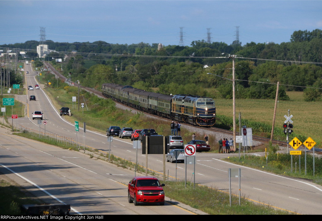 The foam is assembled at the 64th Ave crossing as P001 cruises by